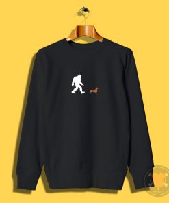 Bigfoot walking a daschund Sweatshirt